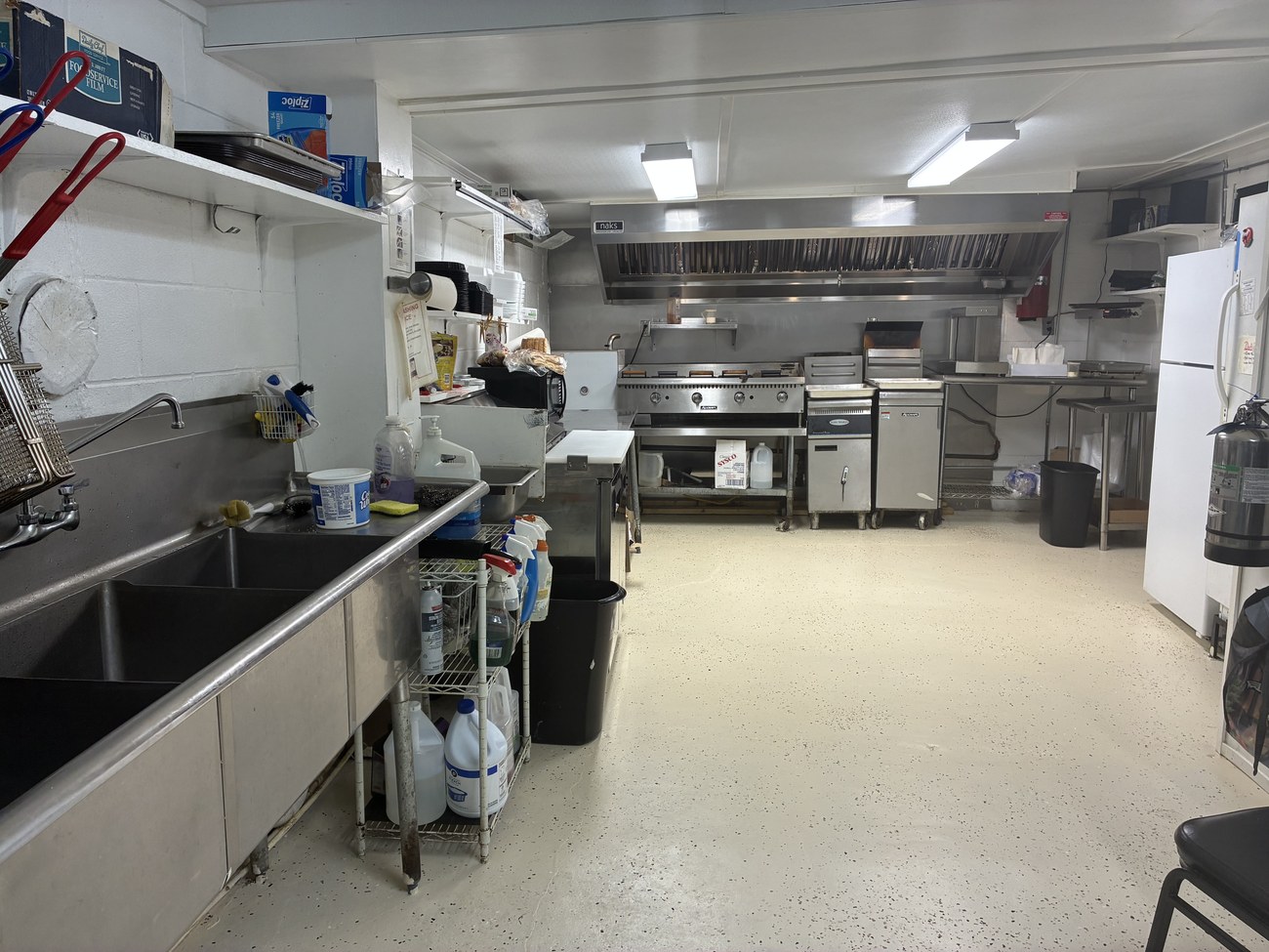 Kitchen prep area with stainless steel tables